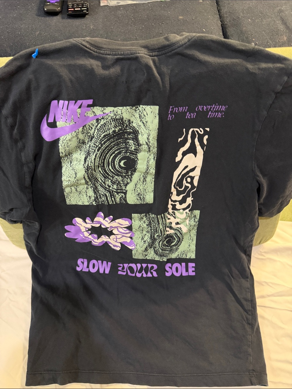 Nike Black Short-Sleeve Graphic Tee with Purple and Green Accents